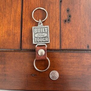 adidas Brown Leather Strap Keychain with Silver Metal Tag